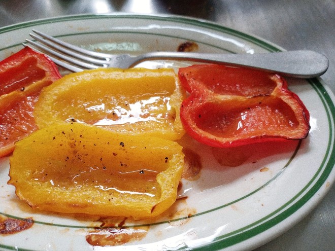 4 pieces of bell pepper in dish with 1 fork