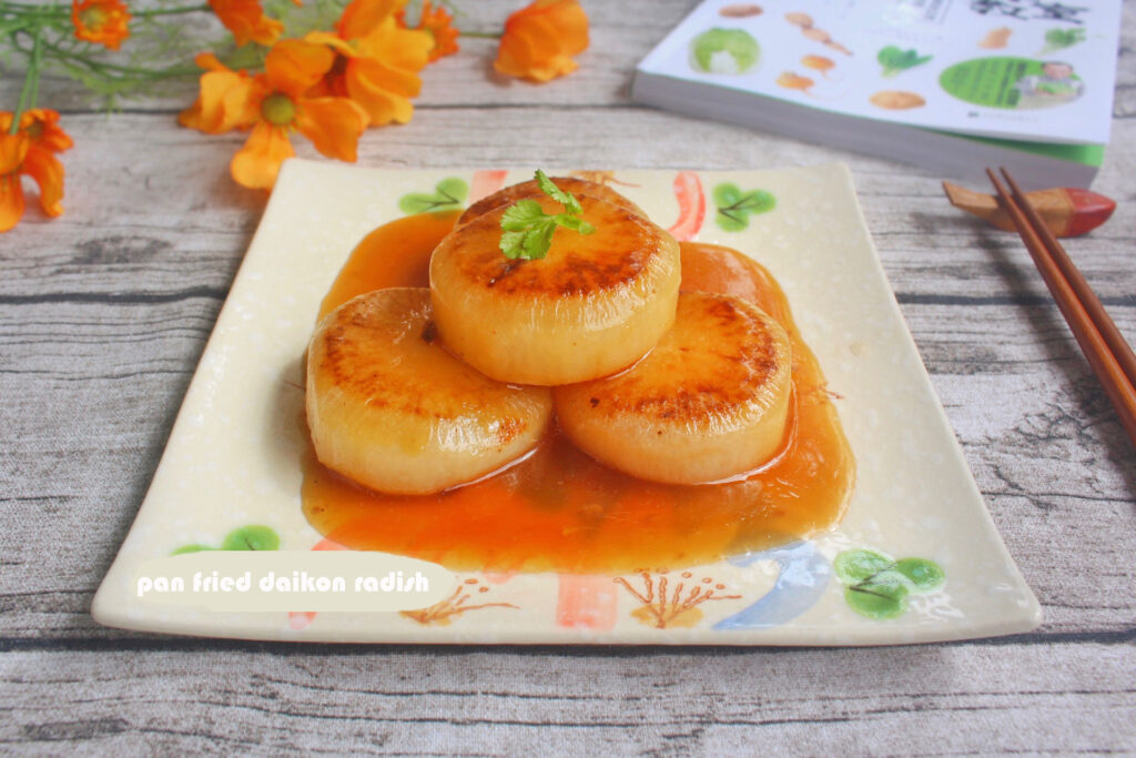 4 pieces pan fried daikon radish in a plate