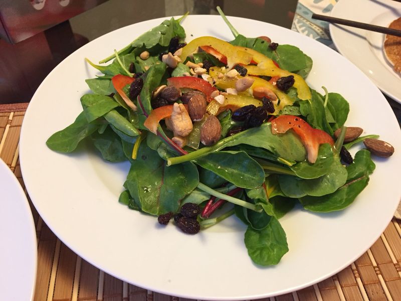 Beet greens salad with dried fruits and nuts