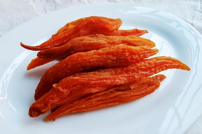 some dried sweet potato strips in a white plate